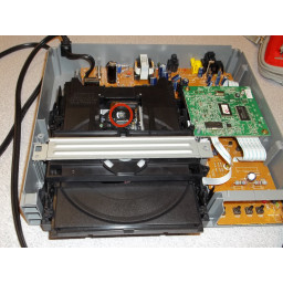 Как очистить оптический объектив Magnavox MWD200F
